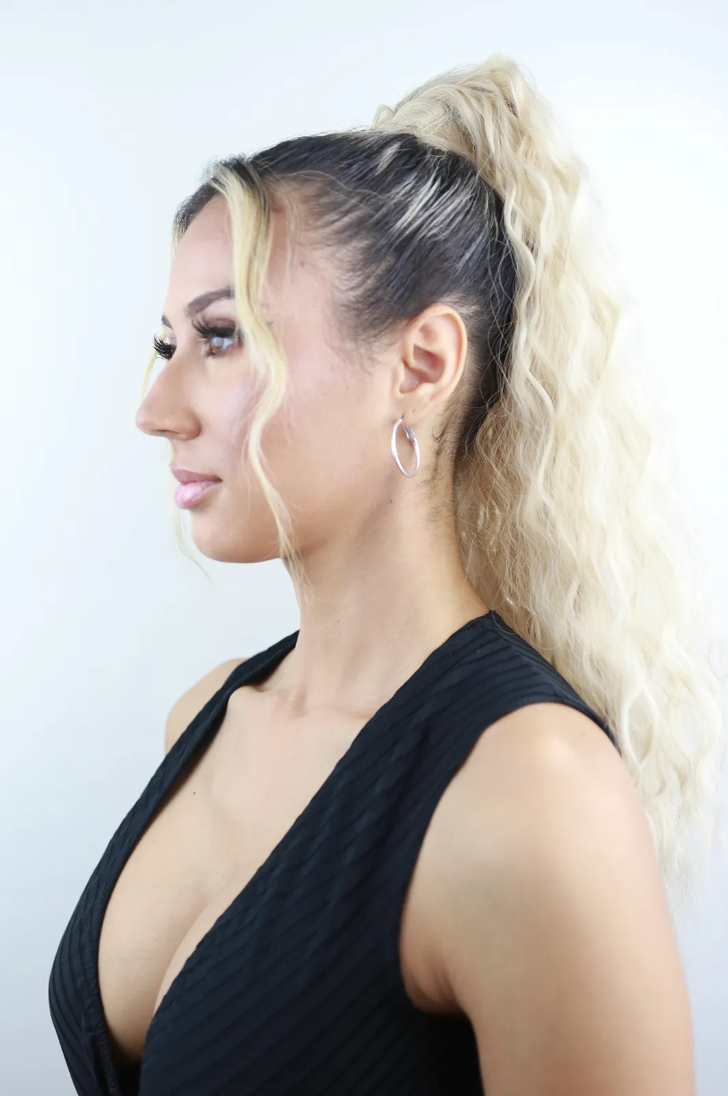 Amerie: 22-Inch Heat Resistant Blonde Synthetic Fibre Ponytail